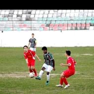 Amarjeet with Estrela's junior squad